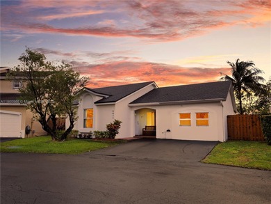 Charming One-Story Home with Golf and Lake Views in Doral Park! on Doral Golf Resort in Florida - for sale on GolfHomes.com, golf home, golf lot