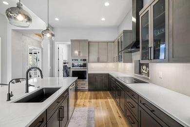 Built in 2022 and perfectly positioned on the 9th hole of the on Aspen Lakes Golf Course in Oregon - for sale on GolfHomes.com, golf home, golf lot