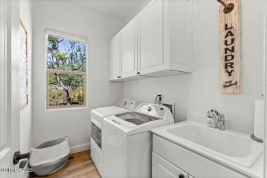 Nestled on a quiet gated street in Somersett, just moments from on Somersett Country Club in Nevada - for sale on GolfHomes.com, golf home, golf lot