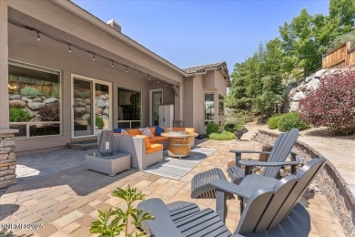 Nestled on a quiet gated street in Somersett, just moments from on Somersett Country Club in Nevada - for sale on GolfHomes.com, golf home, golf lot