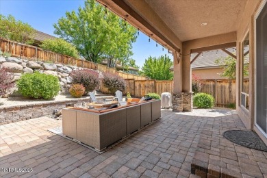 Nestled on a quiet gated street in Somersett, just moments from on Somersett Country Club in Nevada - for sale on GolfHomes.com, golf home, golf lot
