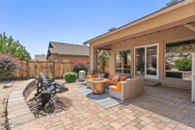 Nestled on a quiet gated street in Somersett, just moments from on Somersett Country Club in Nevada - for sale on GolfHomes.com, golf home, golf lot