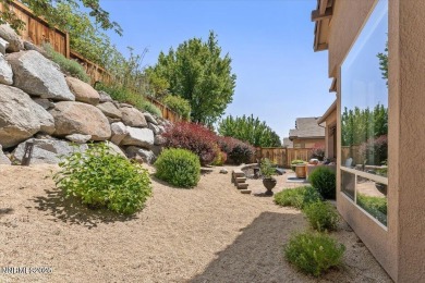 Nestled on a quiet gated street in Somersett, just moments from on Somersett Country Club in Nevada - for sale on GolfHomes.com, golf home, golf lot