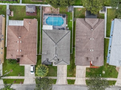 Captivating 4-Bedroom, Pool Home in the Sought-After Lake on The Links of Lake Bernadette in Florida - for sale on GolfHomes.com, golf home, golf lot