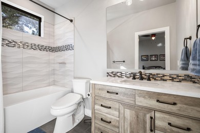 Built in 2022 and perfectly positioned on the 9th hole of the on Aspen Lakes Golf Course in Oregon - for sale on GolfHomes.com, golf home, golf lot