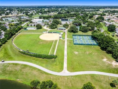 One or more photo(s) has been virtually staged. PREPARE TO BE on Stonecrest Golf and Club Club in Florida - for sale on GolfHomes.com, golf home, golf lot