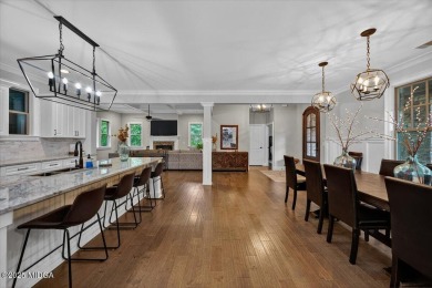 This stunning 4-bedroom, 3.5-bath home on 1.3 acres offers the on The Club River Forest in Georgia - for sale on GolfHomes.com, golf home, golf lot