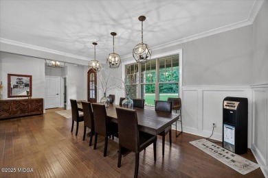 This stunning 4-bedroom, 3.5-bath home on 1.3 acres offers the on The Club River Forest in Georgia - for sale on GolfHomes.com, golf home, golf lot