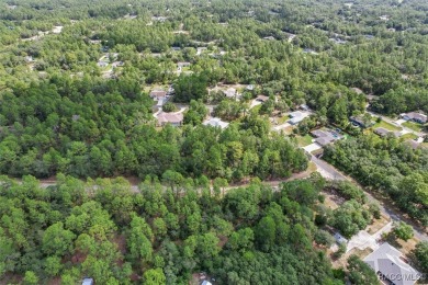 Come build your dream home on this .54 acre lot, situated in a on Pine Ridge Community Golf and Country Club in Florida - for sale on GolfHomes.com, golf home, golf lot