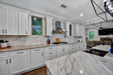 This stunning 4-bedroom, 3.5-bath home on 1.3 acres offers the on The Club River Forest in Georgia - for sale on GolfHomes.com, golf home, golf lot