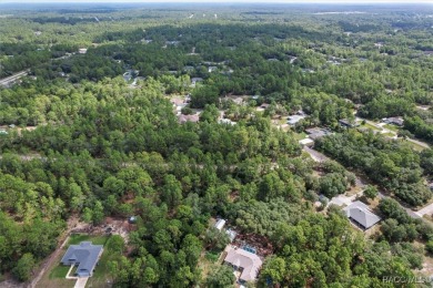 Come build your dream home on this .54 acre lot, situated in a on Pine Ridge Community Golf and Country Club in Florida - for sale on GolfHomes.com, golf home, golf lot