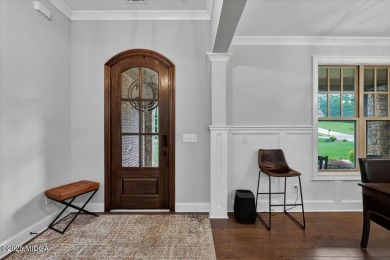 This stunning 4-bedroom, 3.5-bath home on 1.3 acres offers the on The Club River Forest in Georgia - for sale on GolfHomes.com, golf home, golf lot