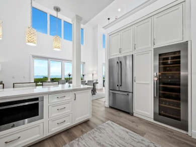 Discover the essence of waterfront elegance in this meticulously on Longboat Key Golf Club in Florida - for sale on GolfHomes.com, golf home, golf lot