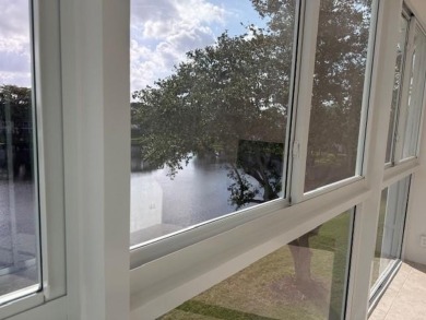 Amazing Water view ALL AROUND. IMPACT WINDOWS AND DOORS FRONT on Hillsboro Pines Golf in Florida - for sale on GolfHomes.com, golf home, golf lot