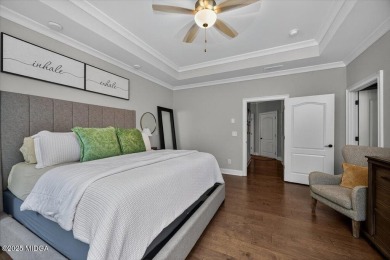 This stunning 4-bedroom, 3.5-bath home on 1.3 acres offers the on The Club River Forest in Georgia - for sale on GolfHomes.com, golf home, golf lot