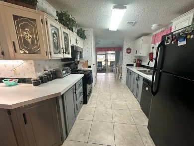 PRICE REDUCED $5,000! Step into this neatly furnished on Four Lakes Golf Club in Florida - for sale on GolfHomes.com, golf home, golf lot