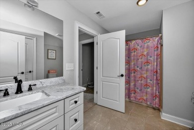 This stunning 4-bedroom, 3.5-bath home on 1.3 acres offers the on The Club River Forest in Georgia - for sale on GolfHomes.com, golf home, golf lot