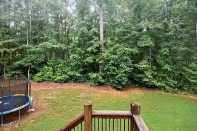 This stunning 4-bedroom, 3.5-bath home on 1.3 acres offers the on The Club River Forest in Georgia - for sale on GolfHomes.com, golf home, golf lot