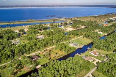 Come build your forever home on this beautiful half acre corner on Indian Lake Estates Golf and Country Club in Florida - for sale on GolfHomes.com, golf home, golf lot