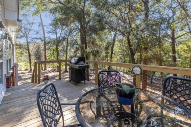 Thoughtfully designed, this 5-bedroom home provides exceptional on Rocky Bayou Country Club in Florida - for sale on GolfHomes.com, golf home, golf lot