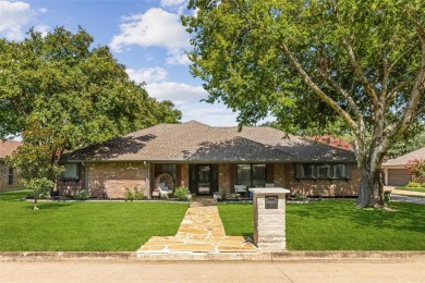 Charming and thoughtfully updated 4-bedroom, 2-bath home in the on Trophy Club of Dallas in Texas - for sale on GolfHomes.com, golf home, golf lot