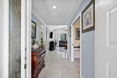 Welcome to this inviting 3-bedroom, 2-bathroom home nestled in on Martin Downs Country Club in Florida - for sale on GolfHomes.com, golf home, golf lot