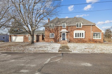 This stunning all-brick home is a prime example of early on Ottumwa Country Club in Iowa - for sale on GolfHomes.com, golf home, golf lot