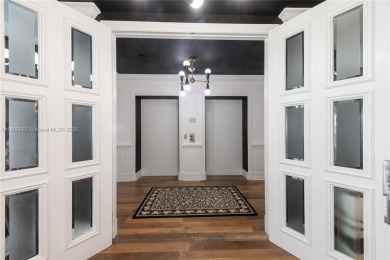 Stunning flow-through condo with private elevator and foyer to on Turnberry Isle Resort and Club in Florida - for sale on GolfHomes.com, golf home, golf lot
