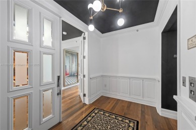 Stunning flow-through condo with private elevator and foyer to on Turnberry Isle Resort and Club in Florida - for sale on GolfHomes.com, golf home, golf lot