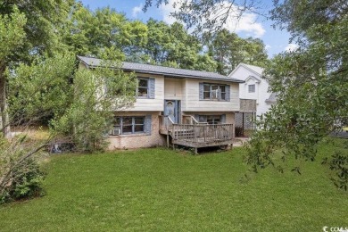 Discover the potential of this 3-bedroom, 2-bath home perfectly on Sea Trail Golf Resort in North Carolina - for sale on GolfHomes.com, golf home, golf lot