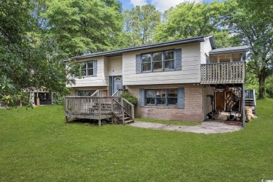 Discover the potential of this 3-bedroom, 2-bath home perfectly on Sea Trail Golf Resort in North Carolina - for sale on GolfHomes.com, golf home, golf lot