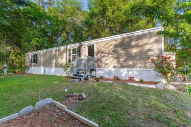 Welcome to your next home sweet home in the heart of Loris, SC! on Woodland Valley Country Club in South Carolina - for sale on GolfHomes.com, golf home, golf lot