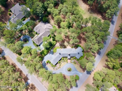 Overlooking the 7th green of Pinewild's Magnolia Course, this on Pinewild Country Club of Pinehurst in North Carolina - for sale on GolfHomes.com, golf home, golf lot
