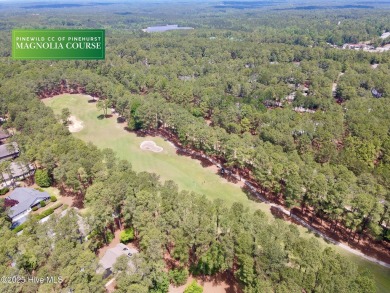 Overlooking the 7th green of Pinewild's Magnolia Course, this on Pinewild Country Club of Pinehurst in North Carolina - for sale on GolfHomes.com, golf home, golf lot