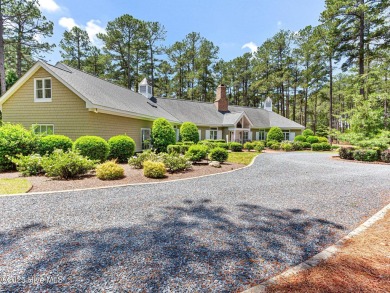 Overlooking the 7th green of Pinewild's Magnolia Course, this on Pinewild Country Club of Pinehurst in North Carolina - for sale on GolfHomes.com, golf home, golf lot