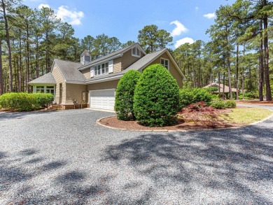Overlooking the 7th green of Pinewild's Magnolia Course, this on Pinewild Country Club of Pinehurst in North Carolina - for sale on GolfHomes.com, golf home, golf lot