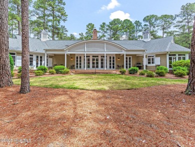 Overlooking the 7th green of Pinewild's Magnolia Course, this on Pinewild Country Club of Pinehurst in North Carolina - for sale on GolfHomes.com, golf home, golf lot