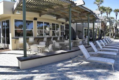 Imagine waking up steps from the sugar-white sands and emerald on Regatta Bay Golf and Country Club in Florida - for sale on GolfHomes.com, golf home, golf lot