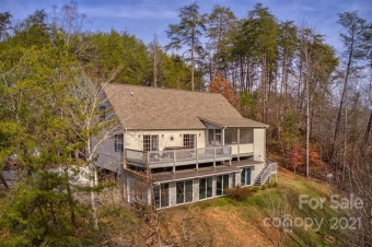 Fully furnished vacation or full-time home on the 6th fairway of on Rumbling Bald Resort on Lake Lure in North Carolina - for sale on GolfHomes.com, golf home, golf lot