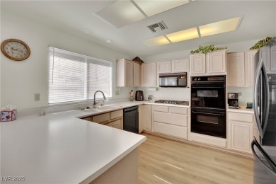 This home sits on a gorgeous corner lot property in Sun City on Highland Falls Golf Club in Nevada - for sale on GolfHomes.com, golf home, golf lot