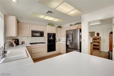 This home sits on a gorgeous corner lot property in Sun City on Highland Falls Golf Club in Nevada - for sale on GolfHomes.com, golf home, golf lot