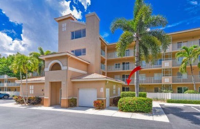 Welcome to beautiful Coral Cove to this spacious ground floor on Westchester Golf and Country Club in Florida - for sale on GolfHomes.com, golf home, golf lot
