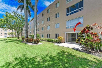 Welcome to beautiful Coral Cove to this spacious ground floor on Westchester Golf and Country Club in Florida - for sale on GolfHomes.com, golf home, golf lot