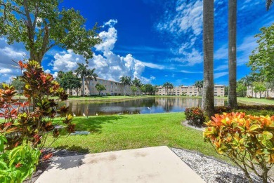 Welcome to beautiful Coral Cove to this spacious ground floor on Westchester Golf and Country Club in Florida - for sale on GolfHomes.com, golf home, golf lot