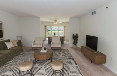 Welcome to beautiful Coral Cove to this spacious ground floor on Westchester Golf and Country Club in Florida - for sale on GolfHomes.com, golf home, golf lot