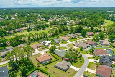This almost new home (a year and half young) in beautiful on The Grand Club Cypress Course in Florida - for sale on GolfHomes.com, golf home, golf lot