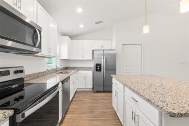 This almost new home (a year and half young) in beautiful on The Grand Club Cypress Course in Florida - for sale on GolfHomes.com, golf home, golf lot