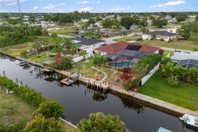 Escape to this Gulf access haven, with prime waterfront on Deep Creek Golf Club in Florida - for sale on GolfHomes.com, golf home, golf lot