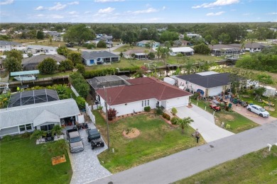 Escape to this Gulf access haven, with prime waterfront on Deep Creek Golf Club in Florida - for sale on GolfHomes.com, golf home, golf lot