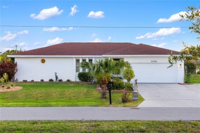 Escape to this Gulf access haven, with prime waterfront on Deep Creek Golf Club in Florida - for sale on GolfHomes.com, golf home, golf lot